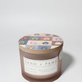 Sand + Paws California Beach House 12 oz scented candle Blush vessel with Painted Paw Grid lid