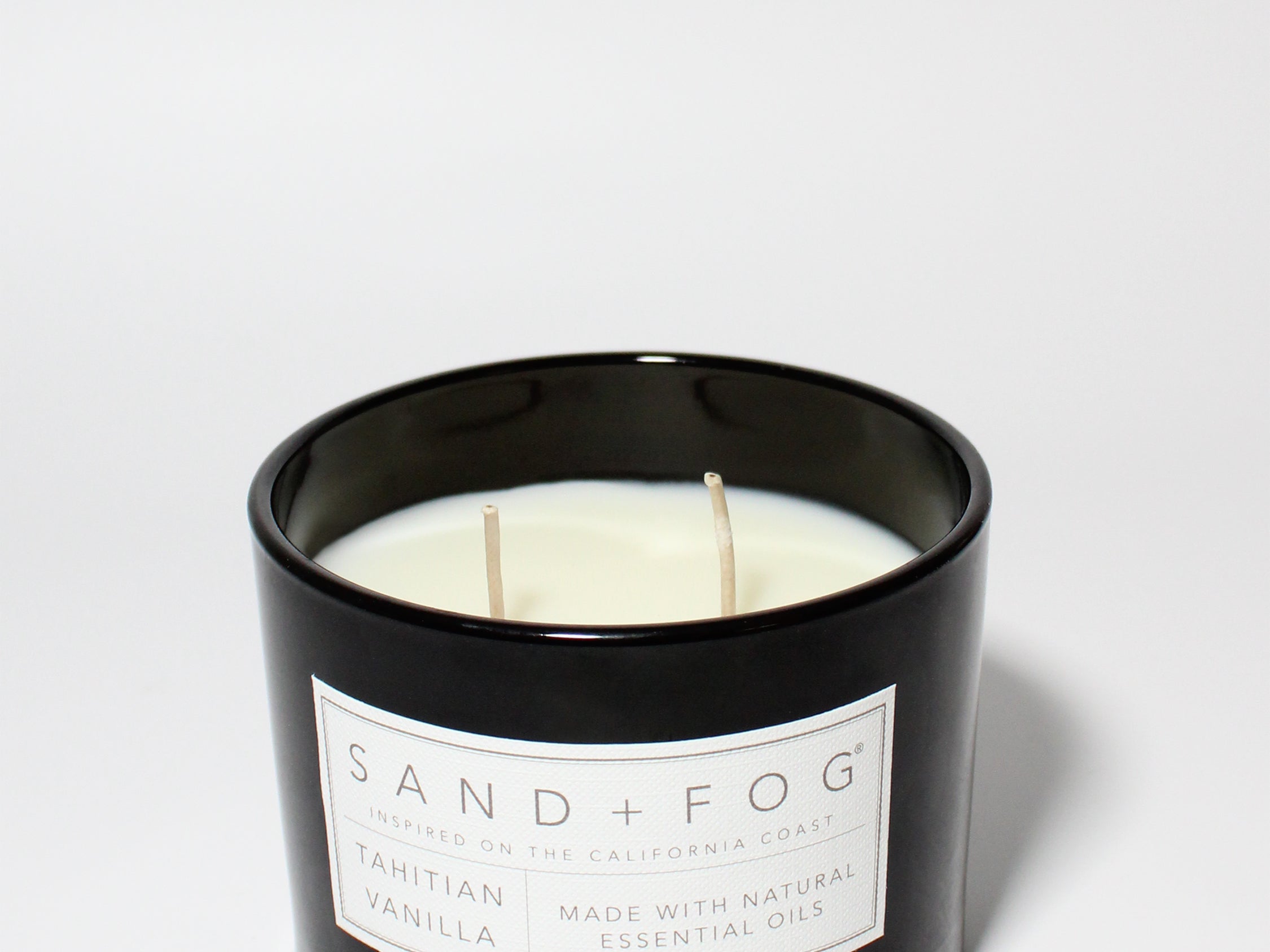 Tahitian Vanilla 12 oz scented candle Black vessel with Carved geometric lid