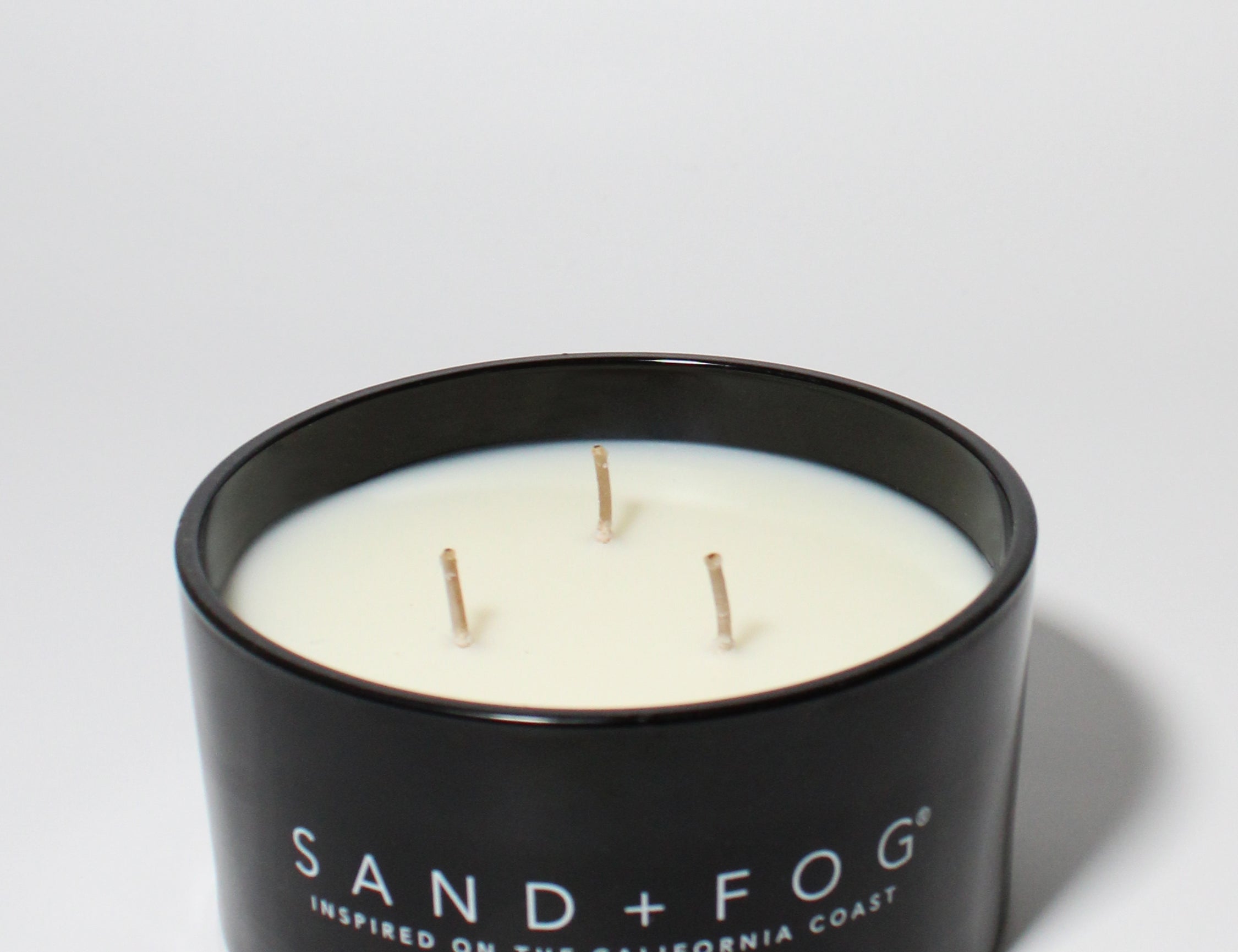 Tahitian Vanilla 10 oz scented candle Black vessel with Carved S+F lid