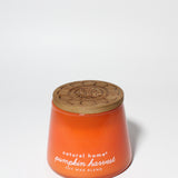 Pumpkin Harvest 11 oz scented candle Orange vessel with Carved Flower wood lid