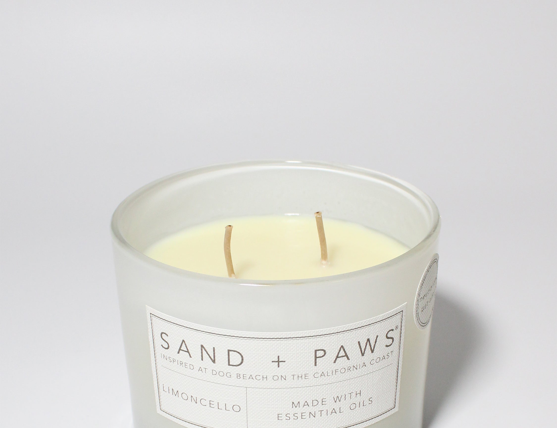 Sand + Paws Limoncello 12 oz scented candle White vessel with Live Love Bark lid