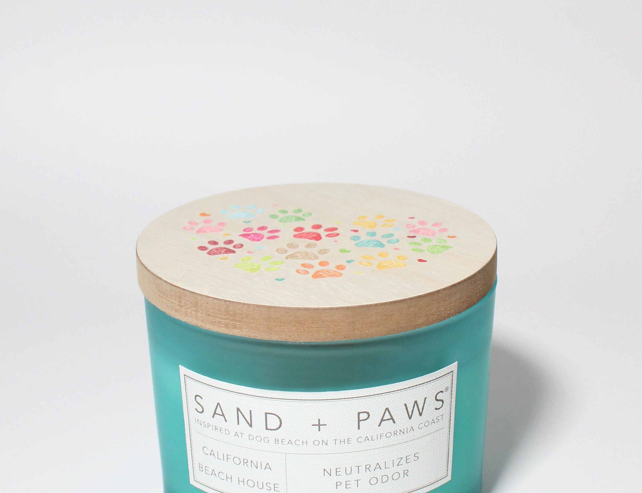 Sand + Paws California Beach House 12 oz scented candle Coast vessel with Painted Colorful Paw Prints in Heart Shape lid