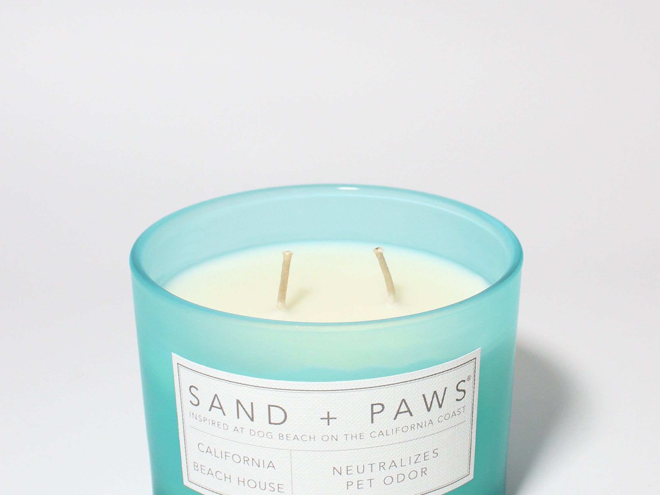 Sand + Paws California Beach House 12 oz scented candle Coast vessel with Painted Colorful Paw Prints in Heart Shape lid