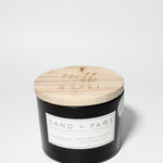 Sand + Paws Teakwood 12 oz scented candle Black vessel with Carved I ruff you lid