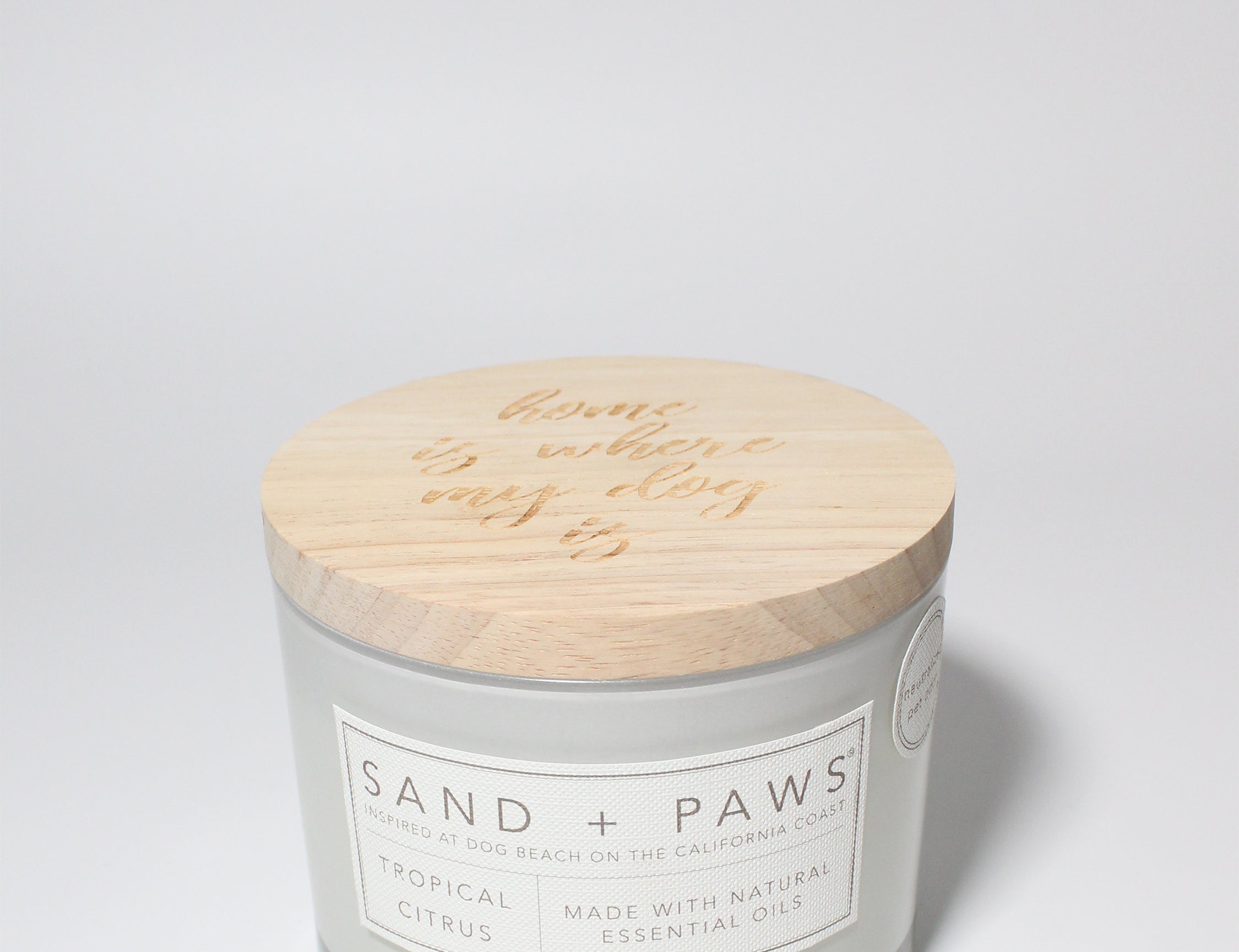 Sand + Paws Tropical Citrus 12 oz scented candle White vessel with Home is Where my Dog is lid