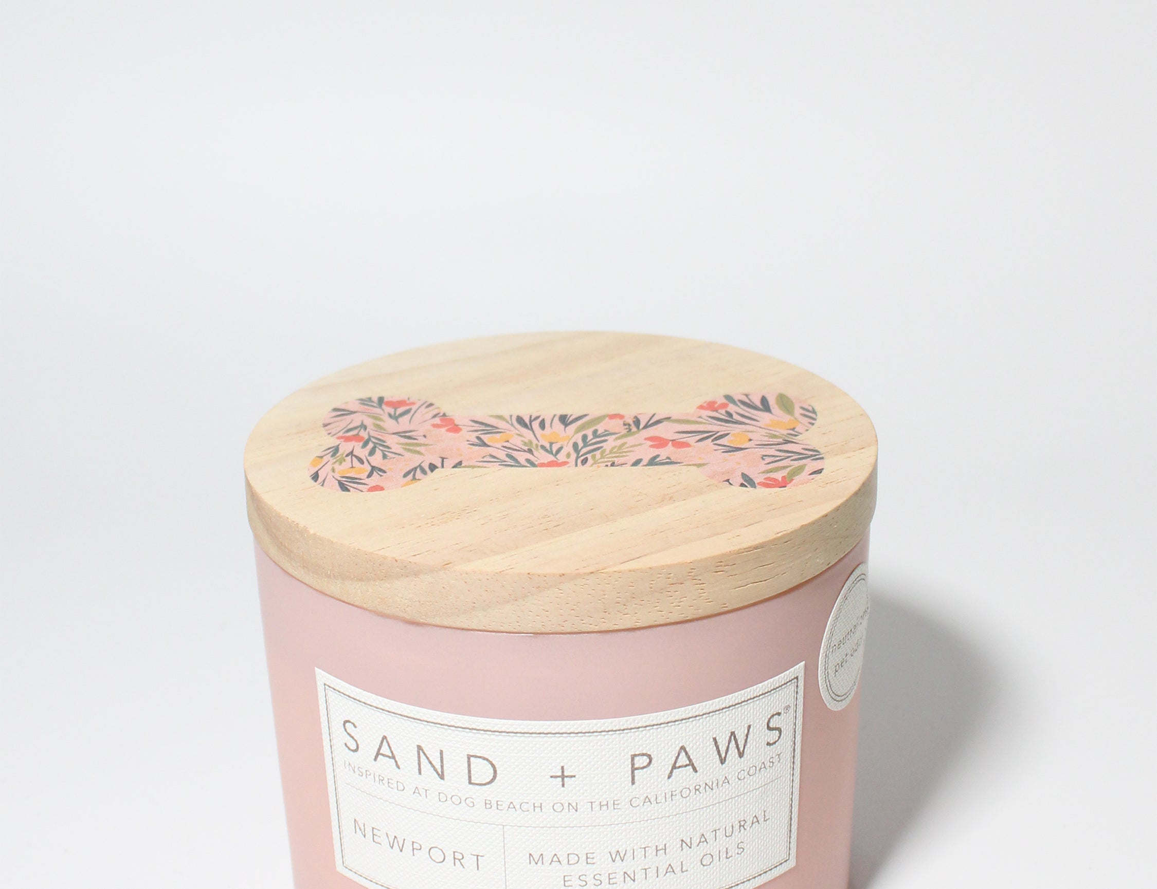 Sand + Paws Newport 12 oz scented candle Peony vessel with Painted Dog Bone lid
