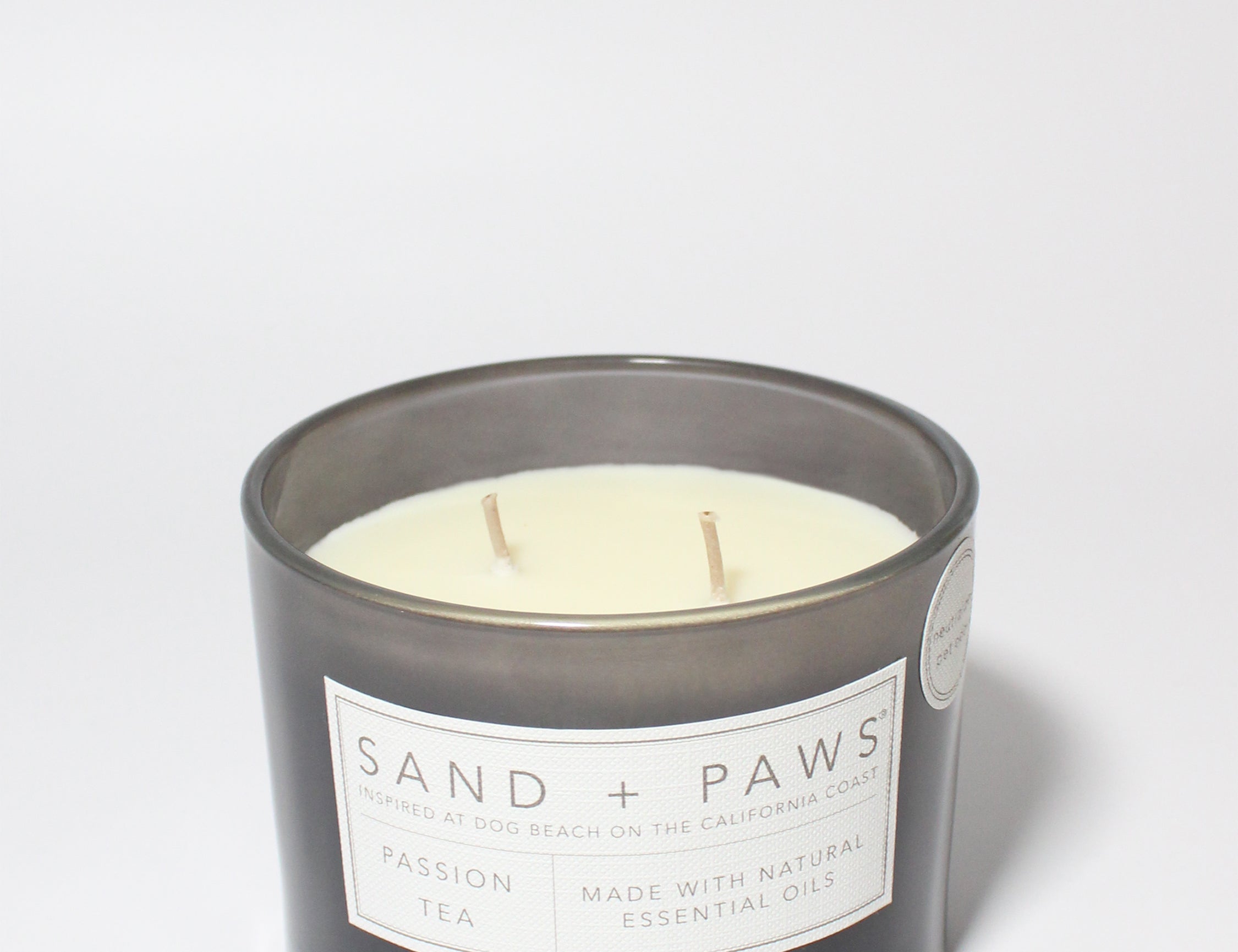 Sand + Paws Passion Tea 12 oz scented candle Tornado vessel with Black Dog Lid