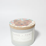 Sand + Paws Tropical Citrus 12 oz scented candle White vessel with Terrier painted lid