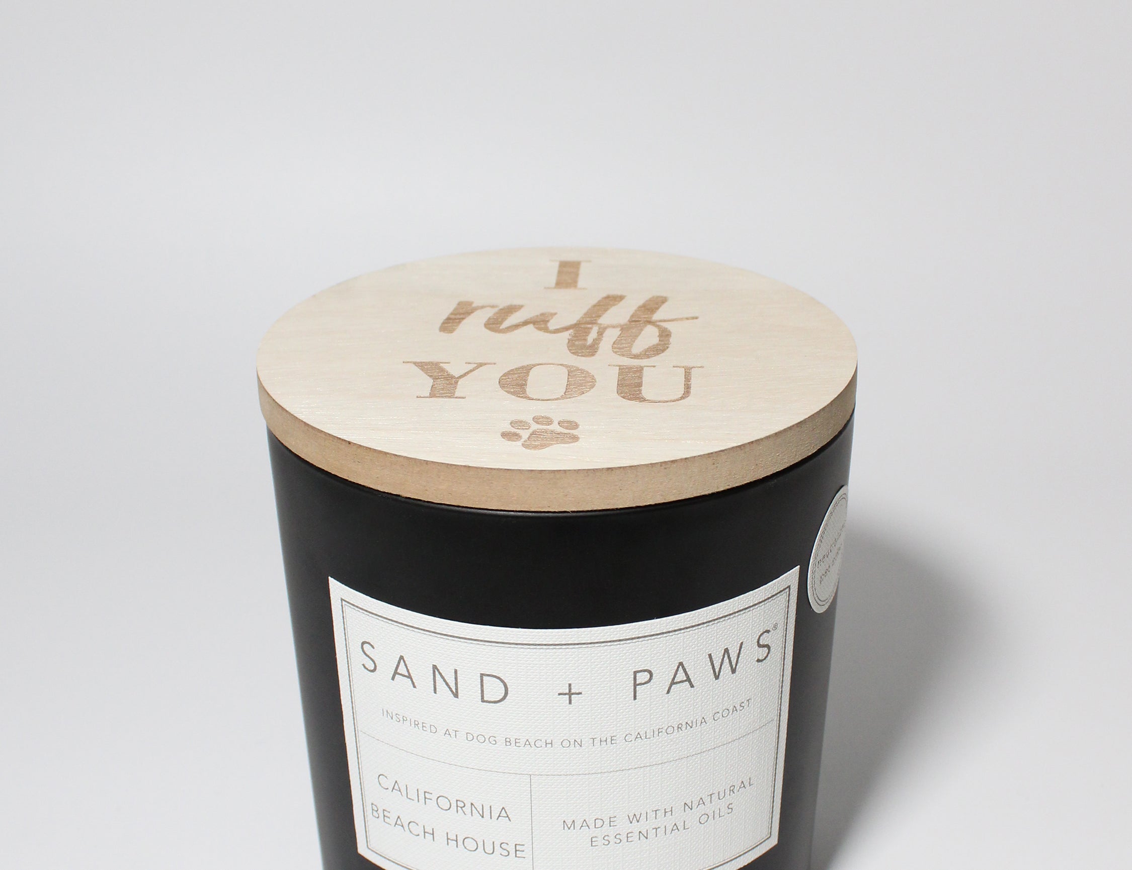 Sand + Paws California Beach House 21 oz scented candle Black vessel with Carved "I ruff you"