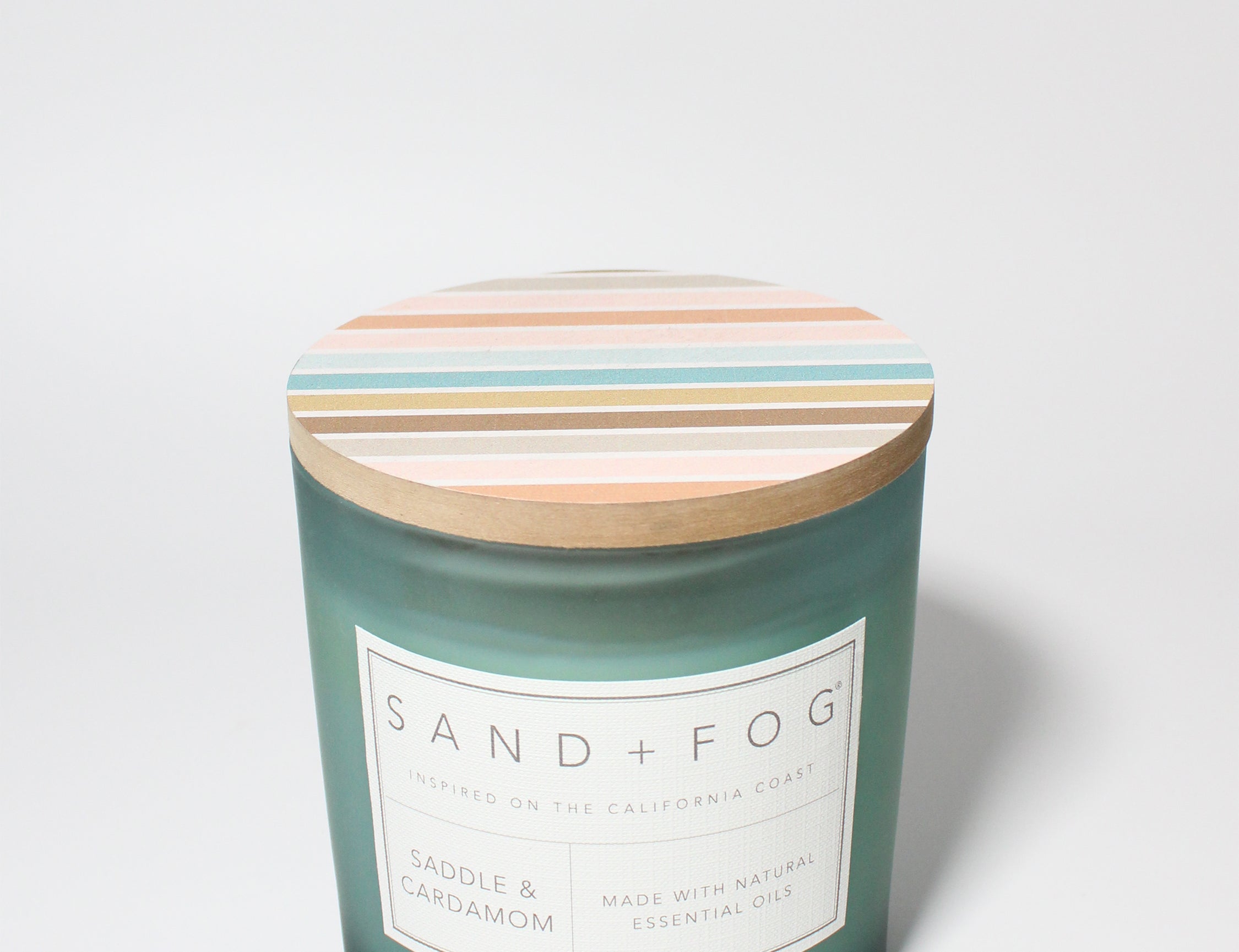 Saddle & Cardamom 21 oz scented candle Seawater vessel with Painted Stripe lid