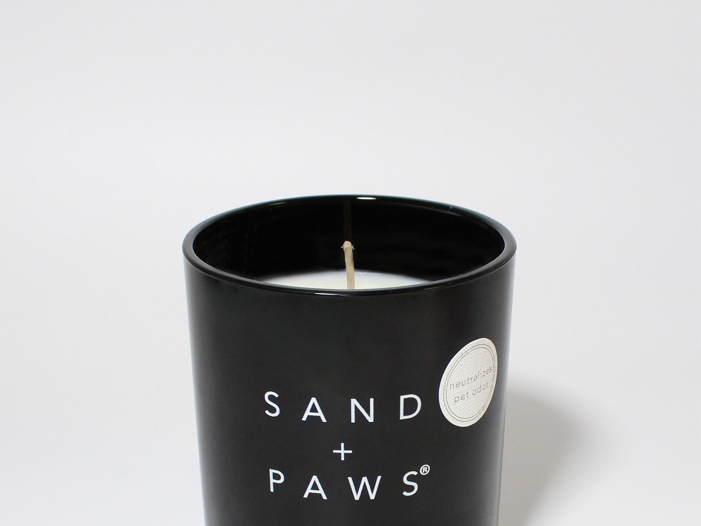 Sand + Paws Teakwood 11.5 oz scented candle Black vessel with cut out Bone wood lid
