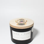 Sand + Paws Teakwood 12 oz scented candle Black vessel with Painted Doodle lid
