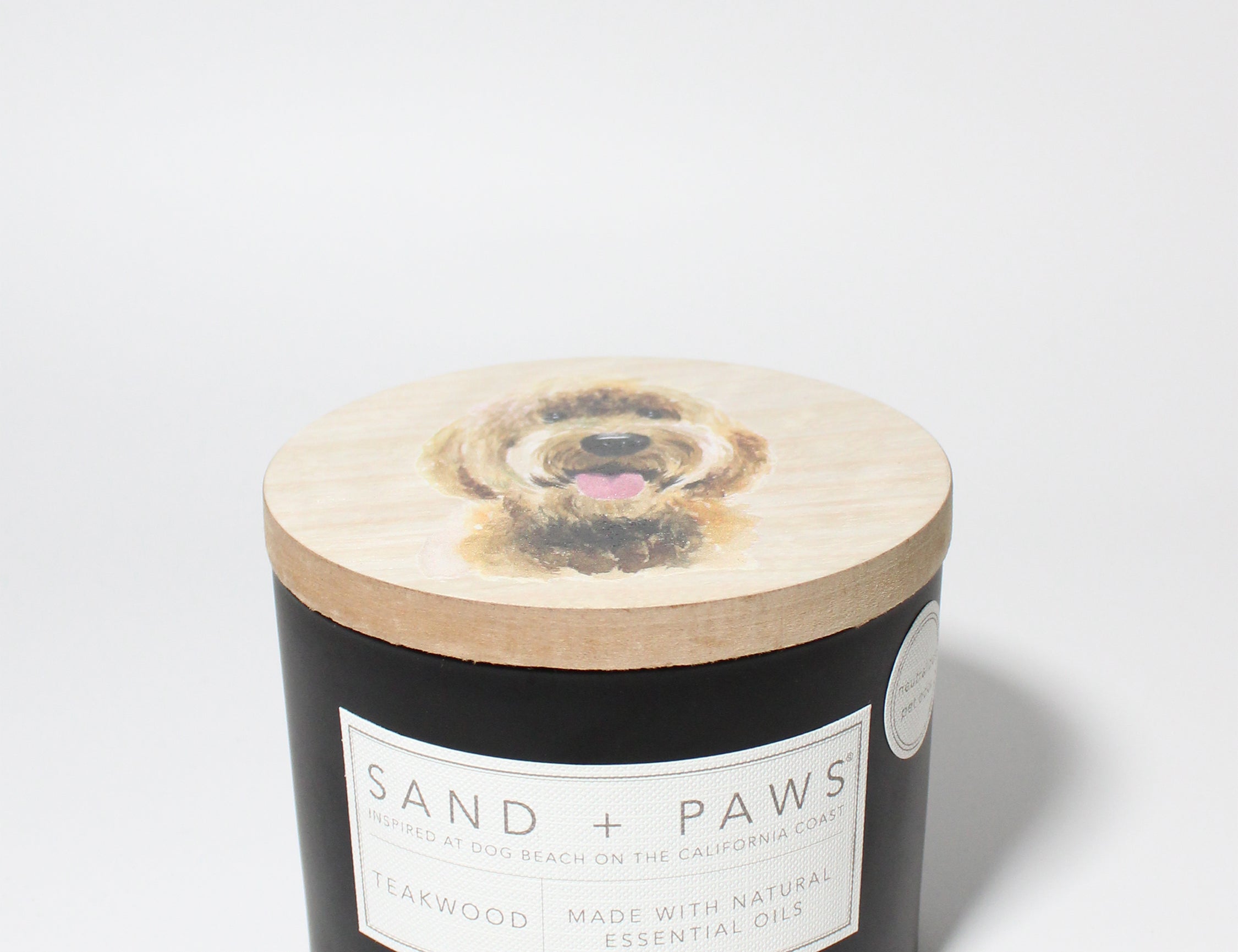 Sand + Paws Teakwood 12 oz scented candle Black vessel with Painted Doodle lid