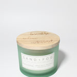 Eucalyptus 12 oz scented candle Sea Foam vessel with breathe relax unwind lid