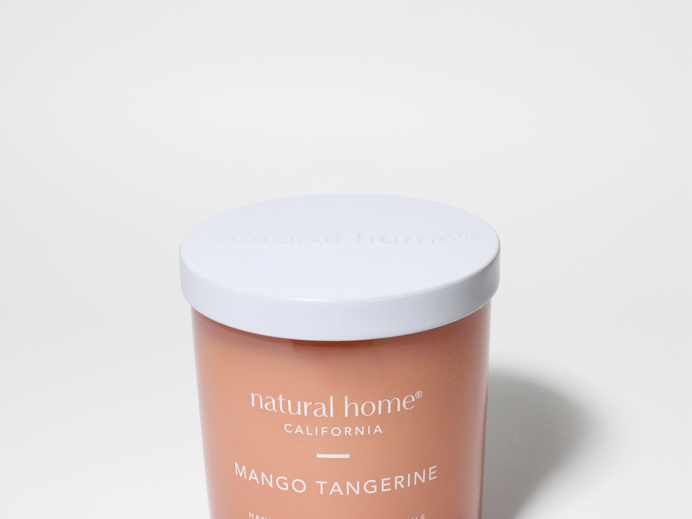 Mango Tangerine Natural Home 11.5 oz scented candle Coral vessel with metal lid and one wick