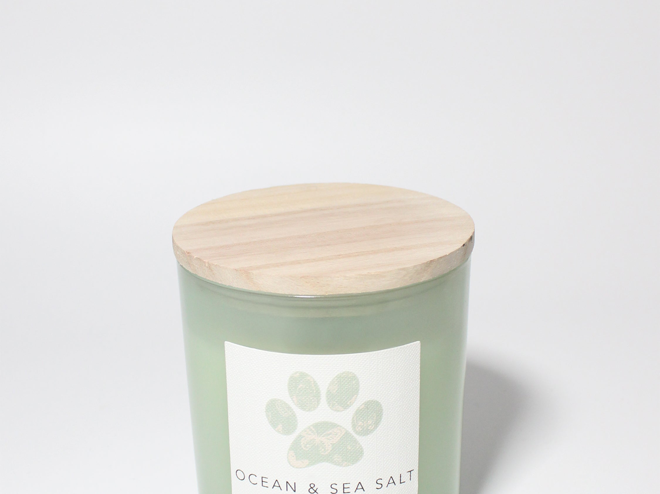 Sand + Paws Ocean & Sea Salt 12 oz scented candle Sage vessel with wood lid and One Wick