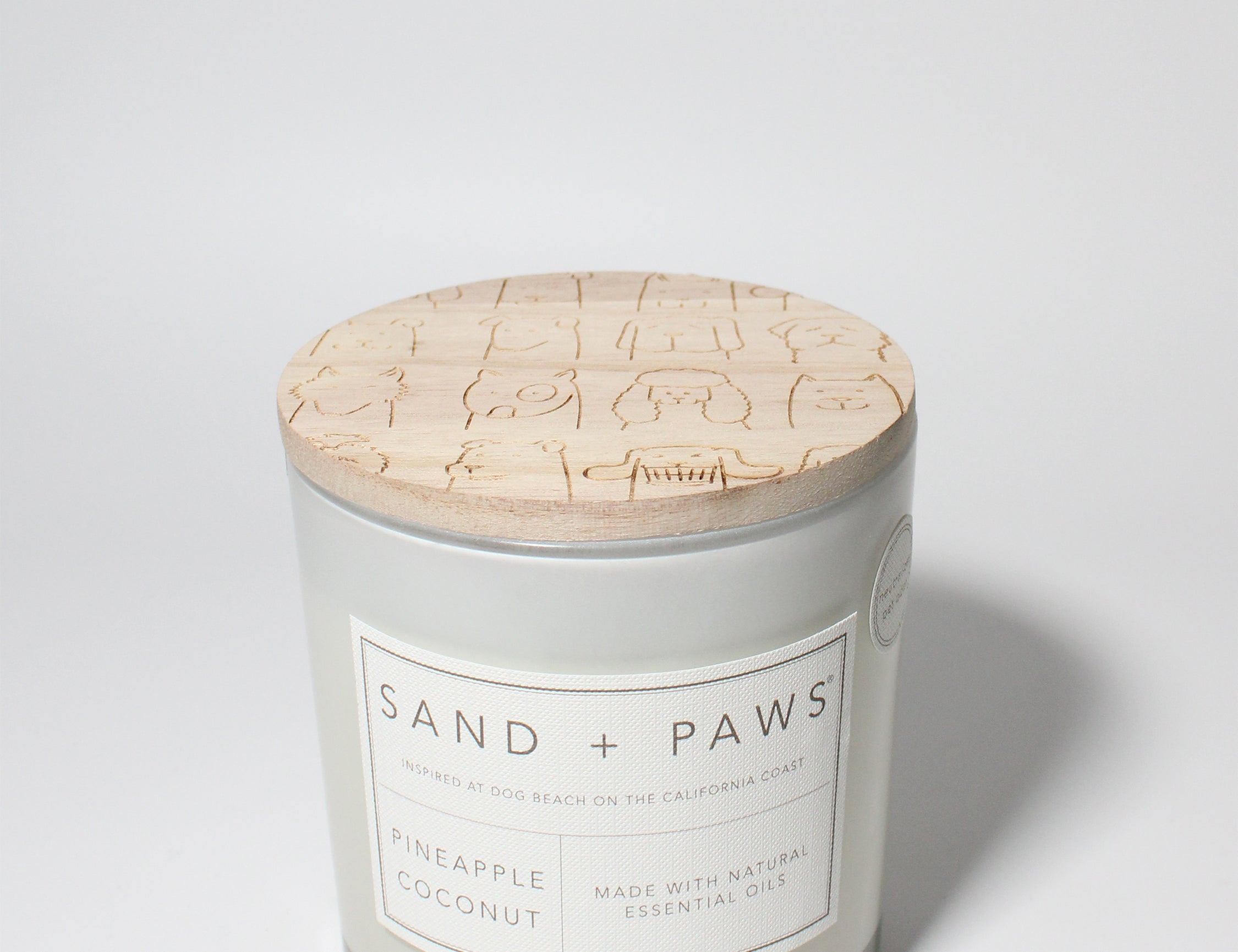 Sand + Paws Pineapple Coconut 21 oz scented candle White vessel with Multi-Breed carved wood lid