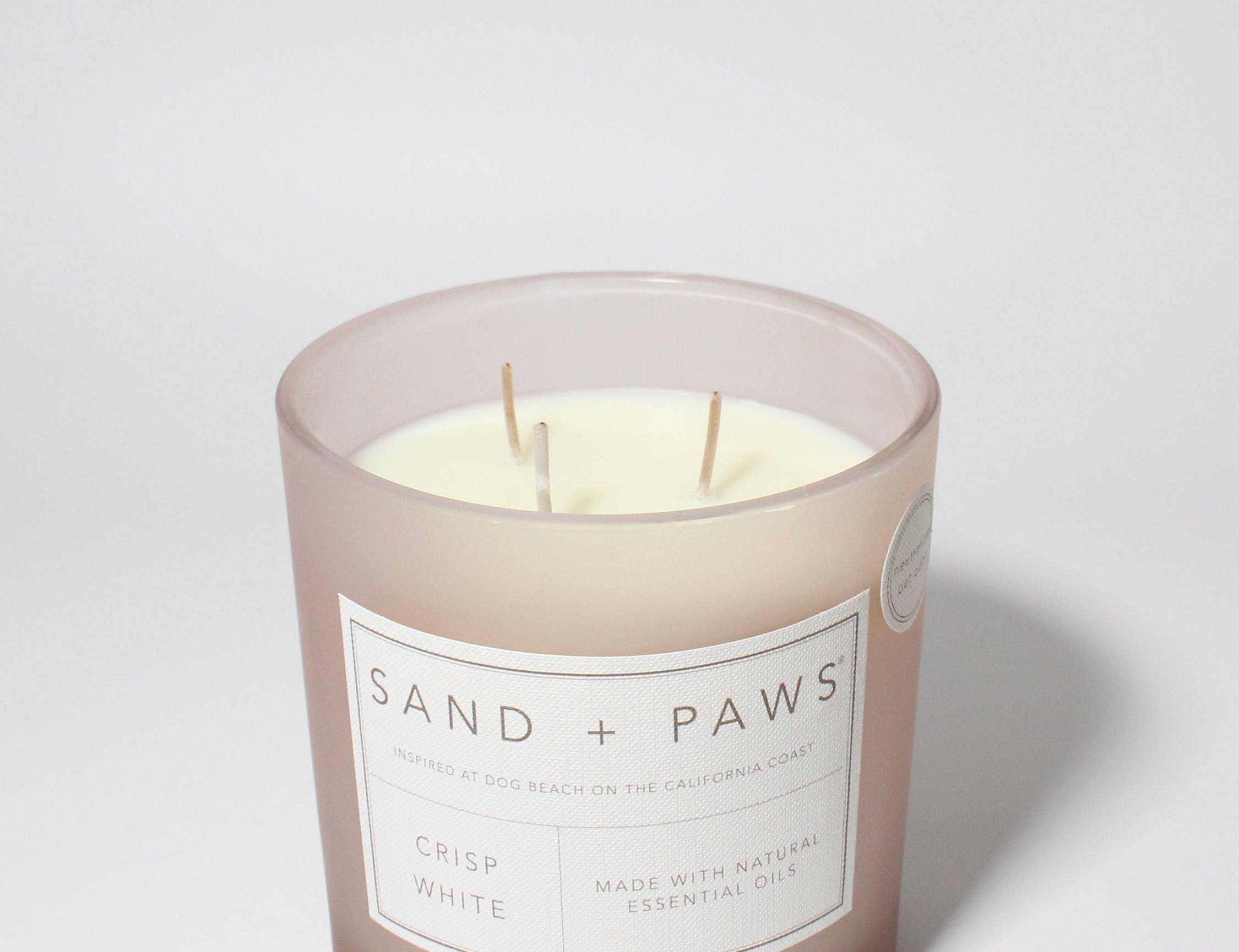 Sand + Paws Crisp White 21 oz scented candle Blush vessel with You're Pawsome wood lid
