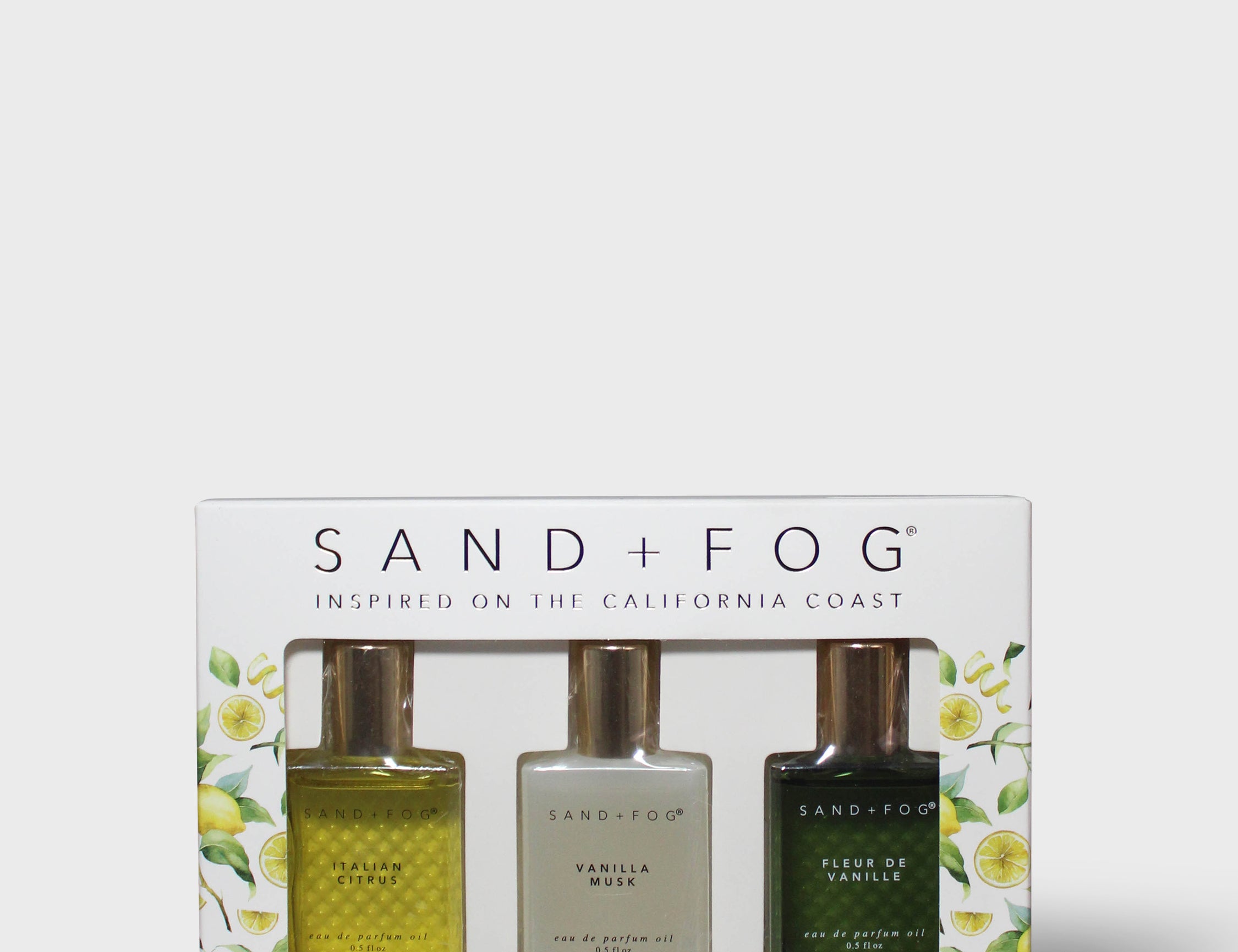 Perfume oil discovery set box with three rollerball bottles, Sand+Fog