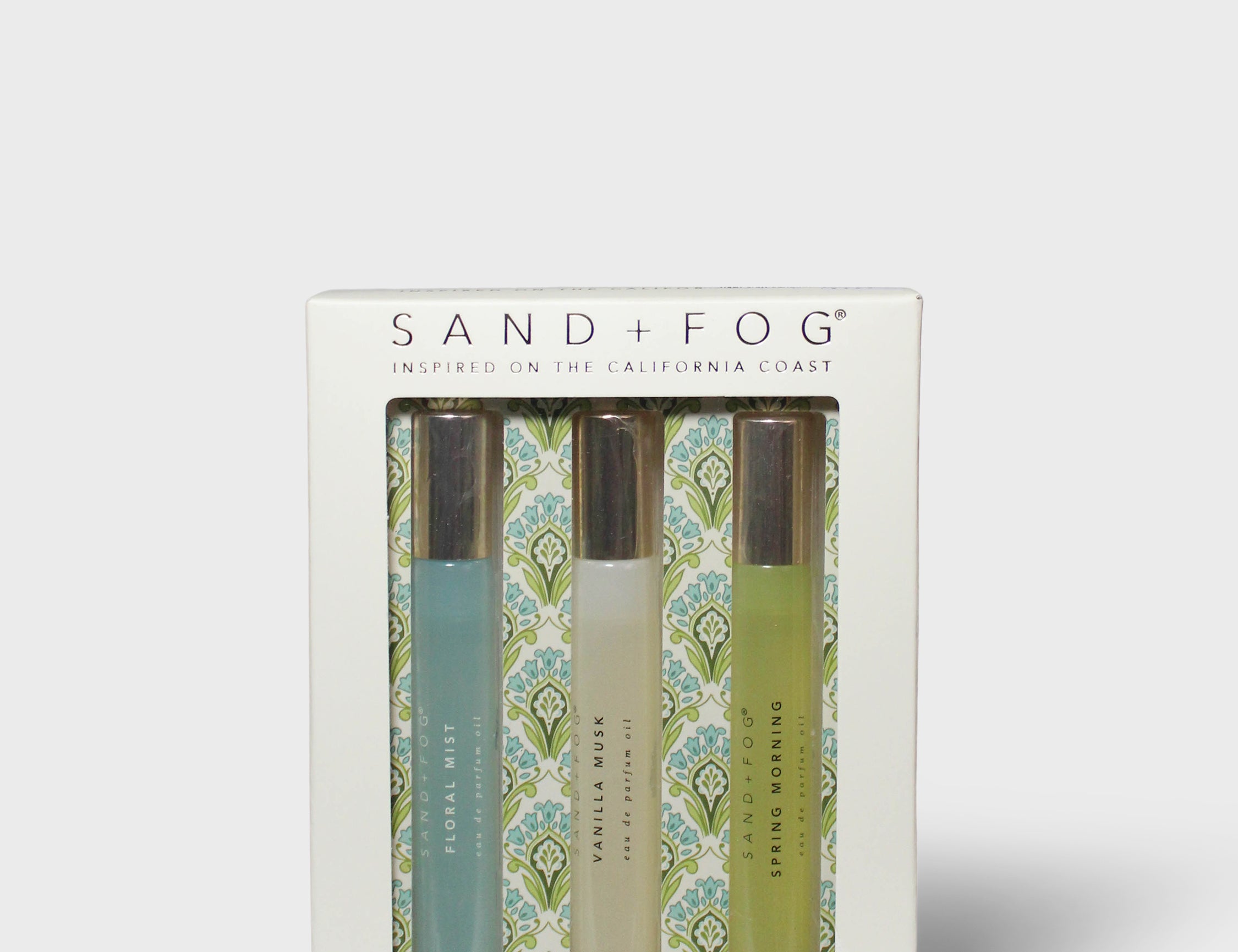 Sand + Fog perfume oil rollerball set in floral patterned gift box, four bottles