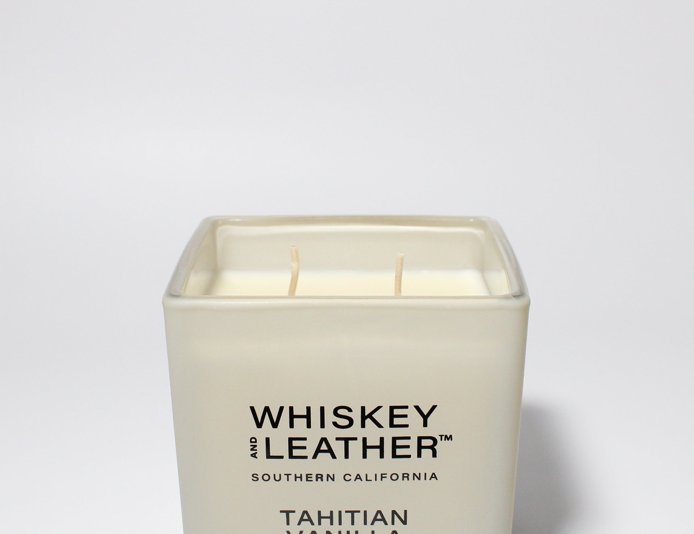 Whiskey and Leather Tahitian Vanilla 16 oz scented candle White vessel with white lid