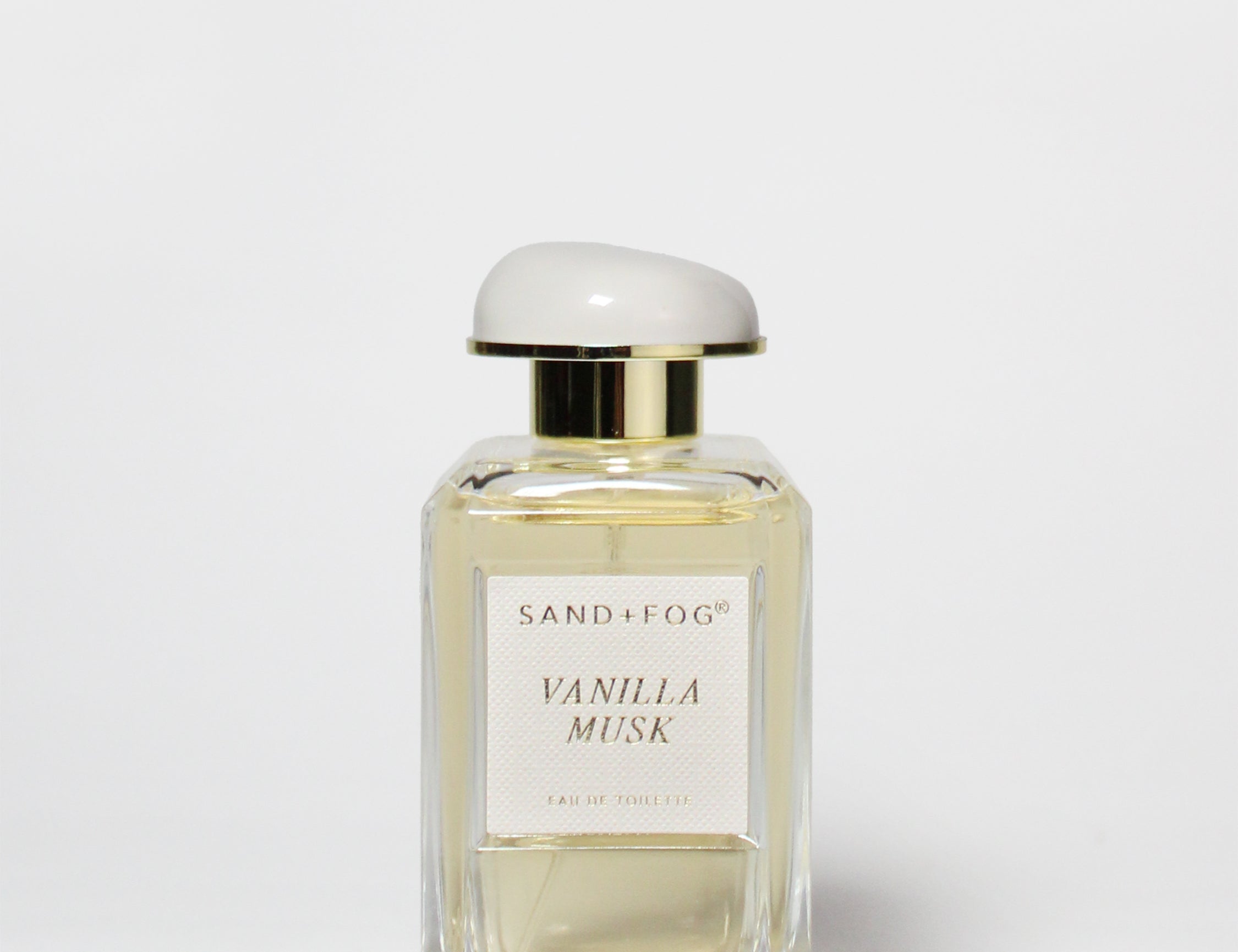 Eau de toilette spray bottle, Sand+Fog Vanilla Musk, clear glass with gold cap