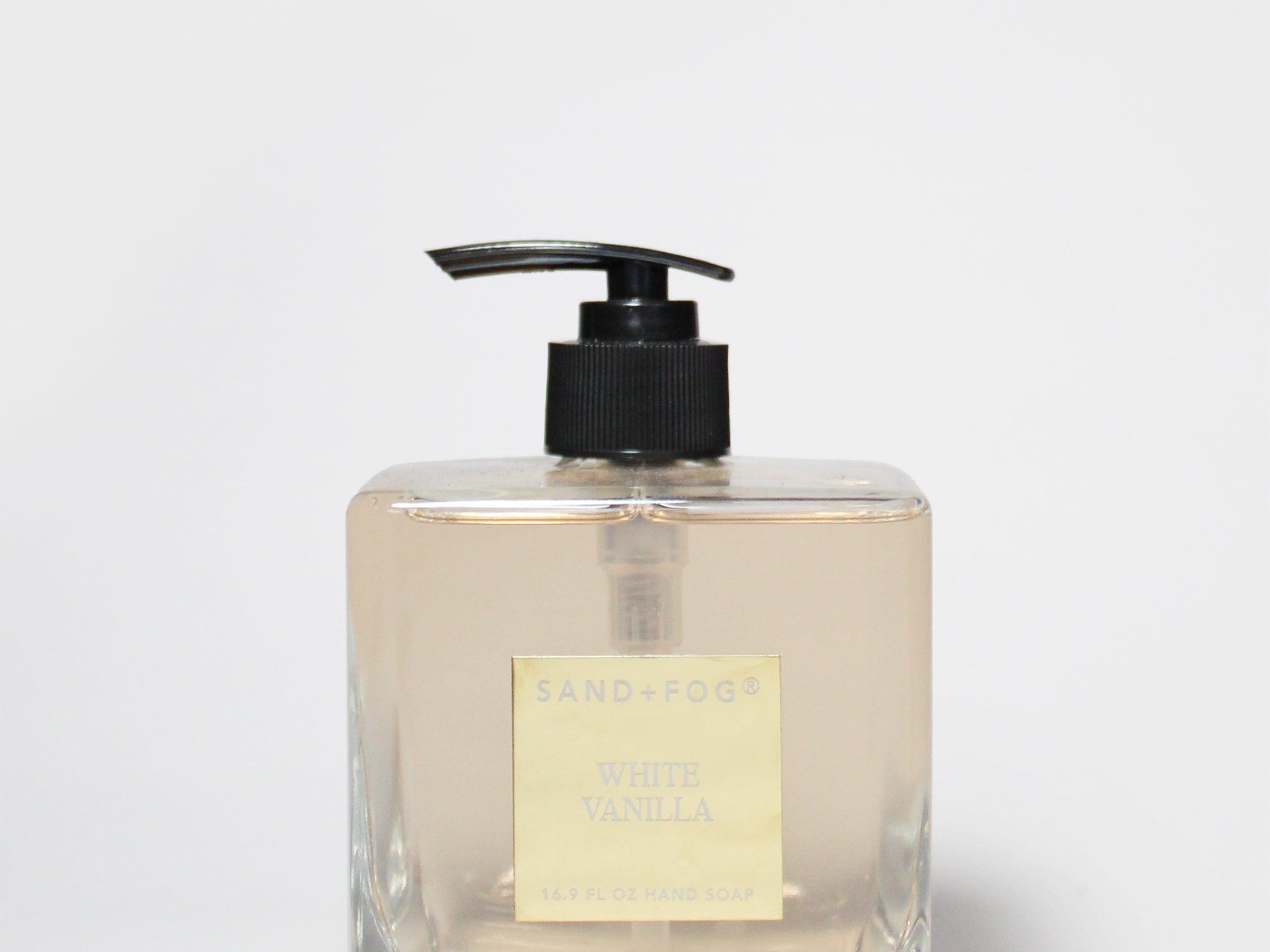 Clear square liquid hand soap bottle with black pump, vanilla label