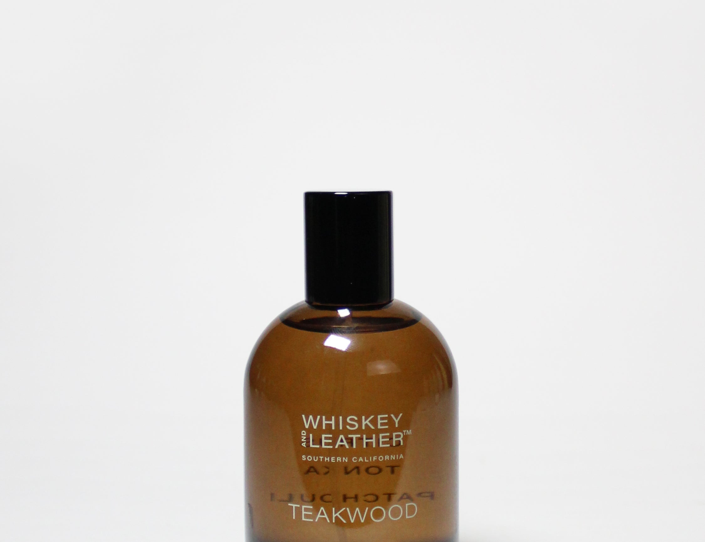 teakwood and tobacco perfume Mya Armando make & room spray at our sunny factory in California and furniture TEAKWOOD & TOBACCO ROOM SPRAY