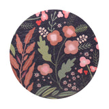 Floral-pattern candle lid with dark background and pastel flowers