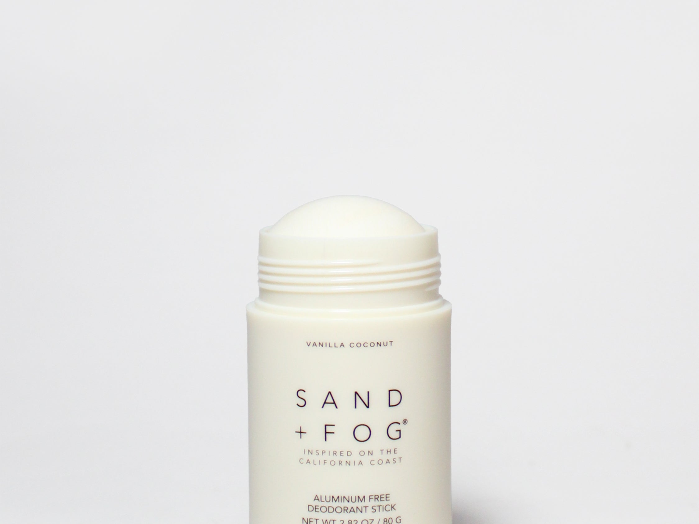 Vanilla coconut deodorant stick, off-white plastic container with screw cap