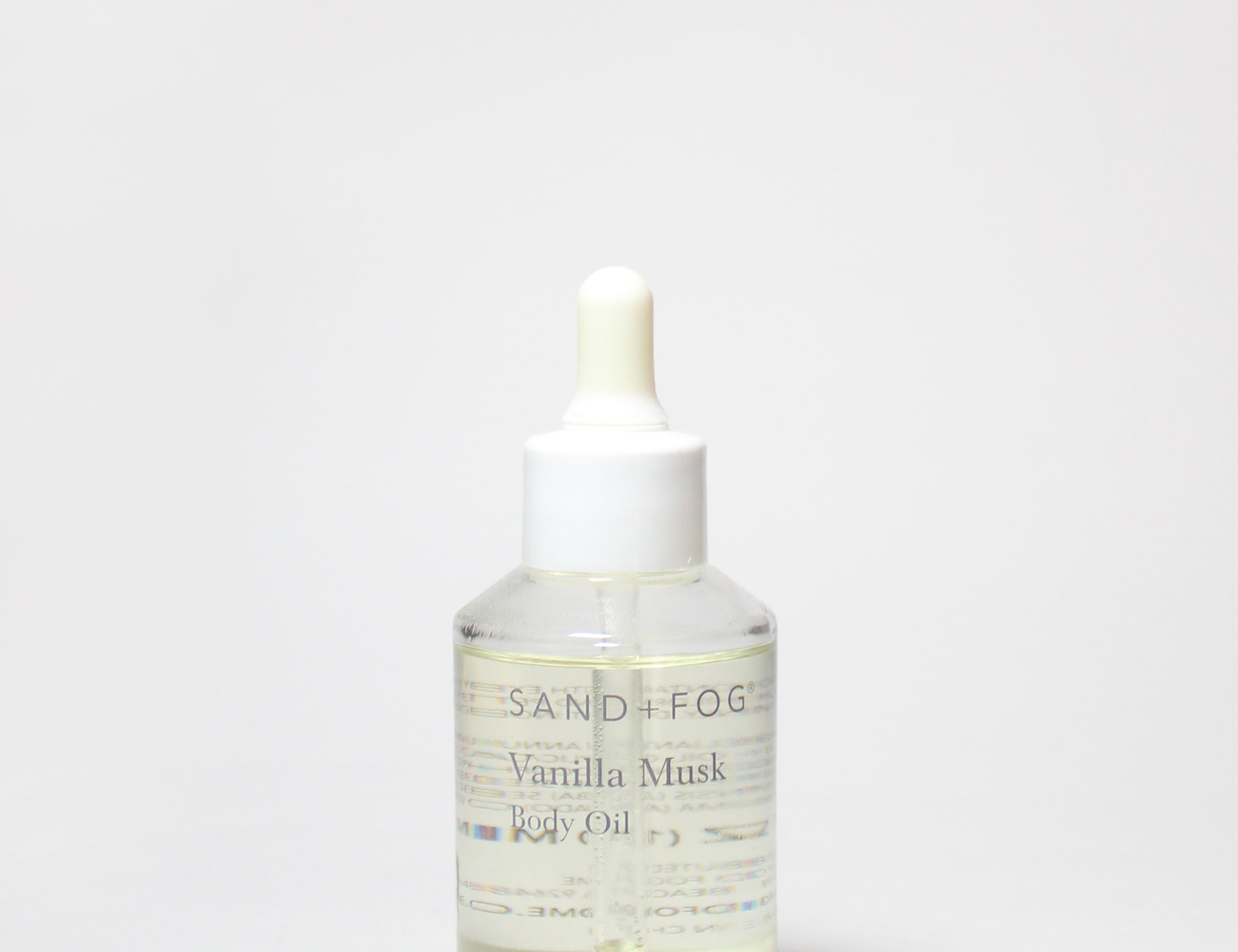 Vanilla musk perfume oil dropper bottle with white cap and glass vial