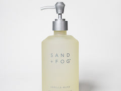 Liquid hand soap bottle with silver pump, Vanilla Musk fragrance, translucent pale yellow.