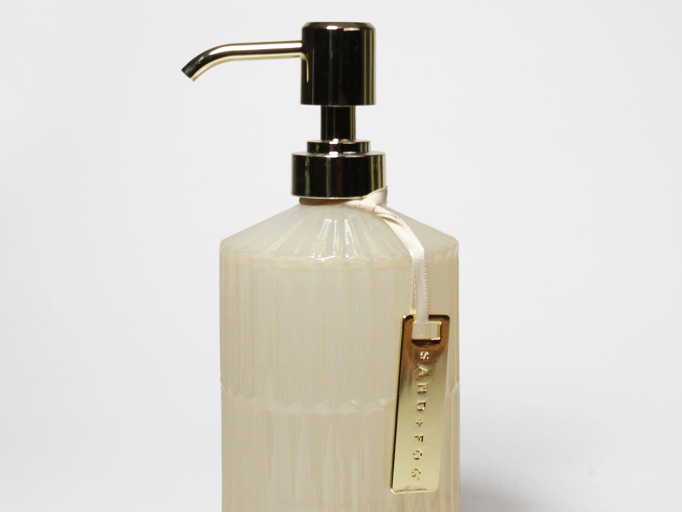 Ribbed frosted liquid hand soap bottle with gold pump