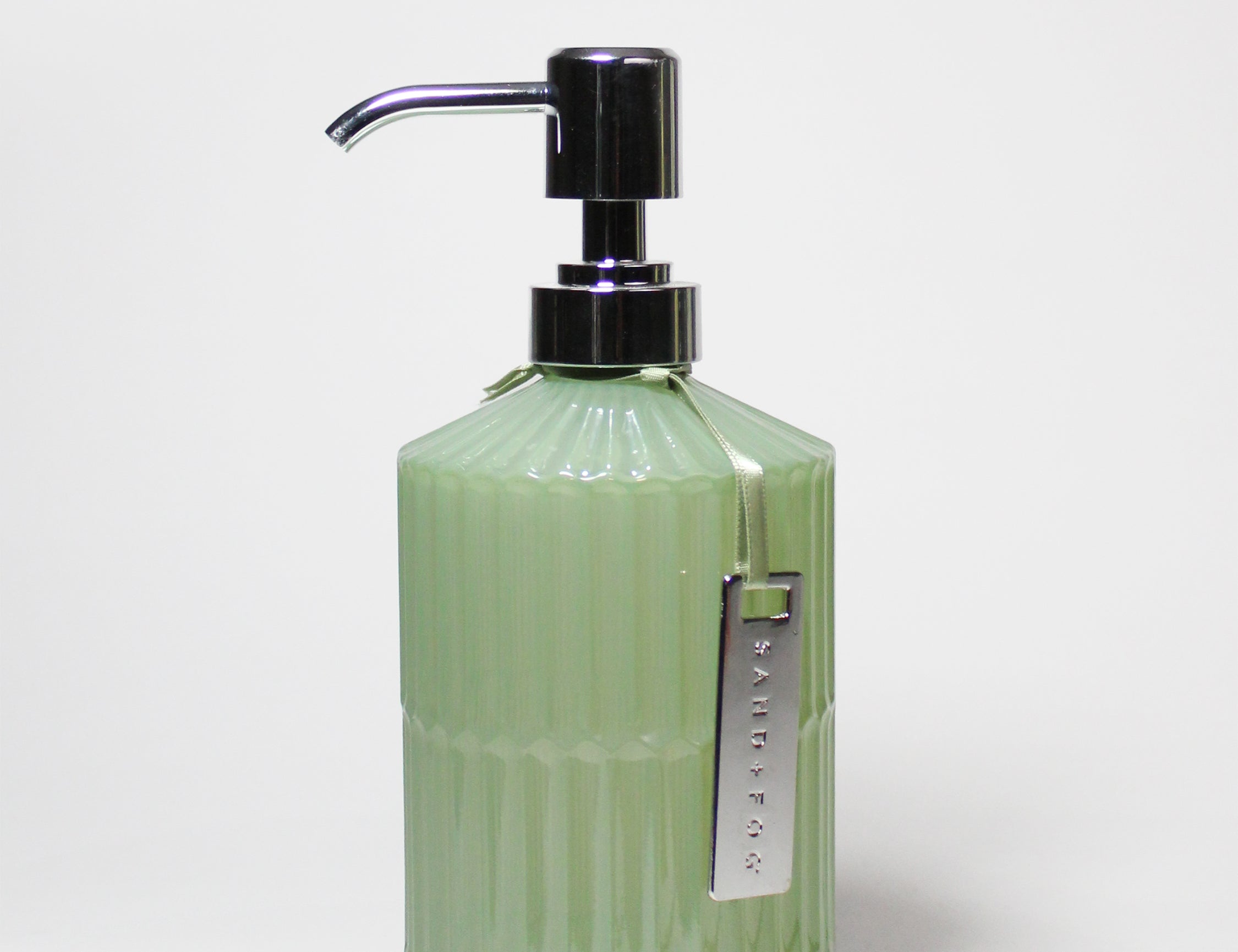 Green ribbed liquid hand soap bottle with chrome pump