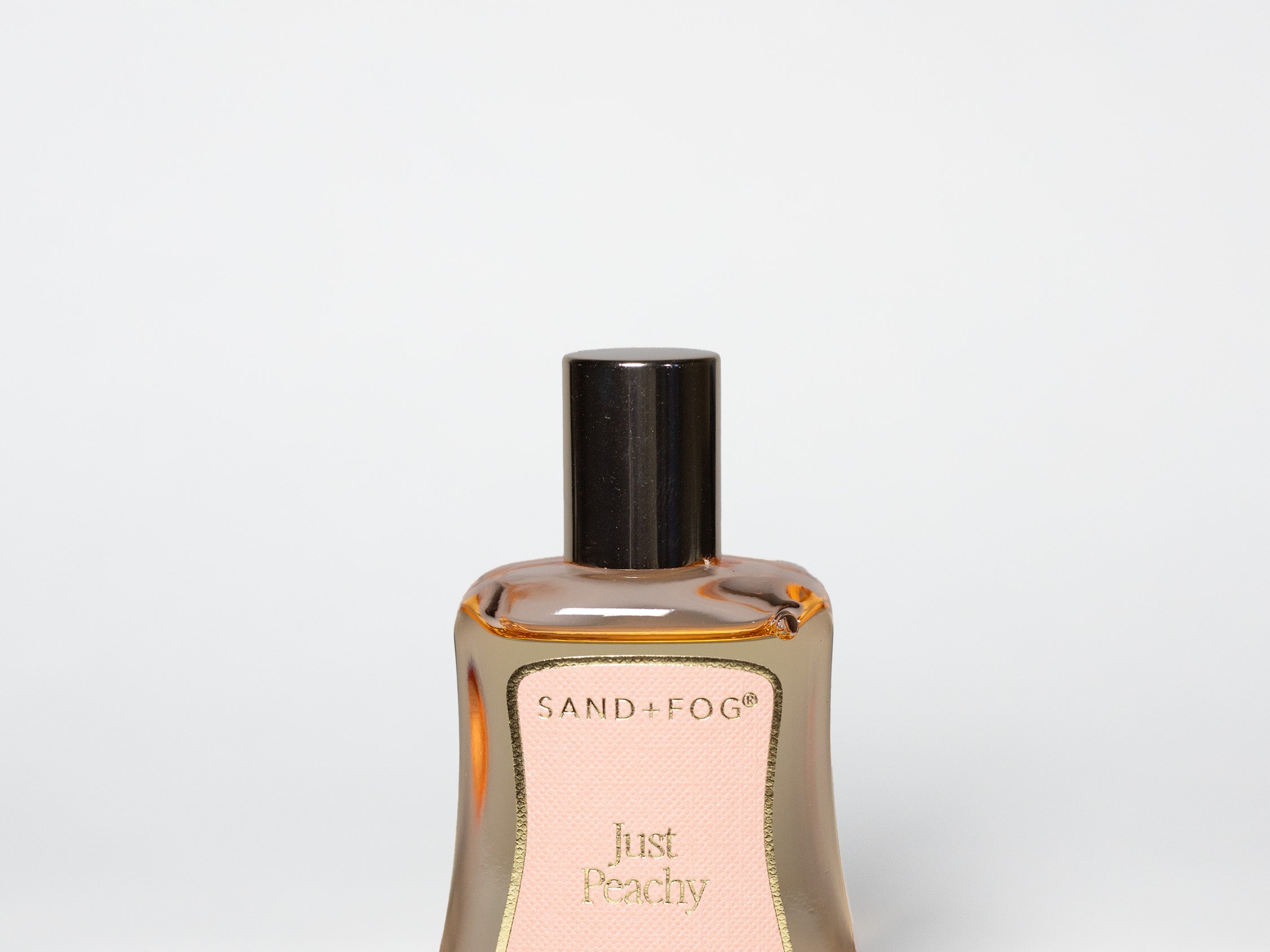 Just Peachy perfume oil rollerball 50ml in pink bottle - juicy peach fragrance by Sand + Fog