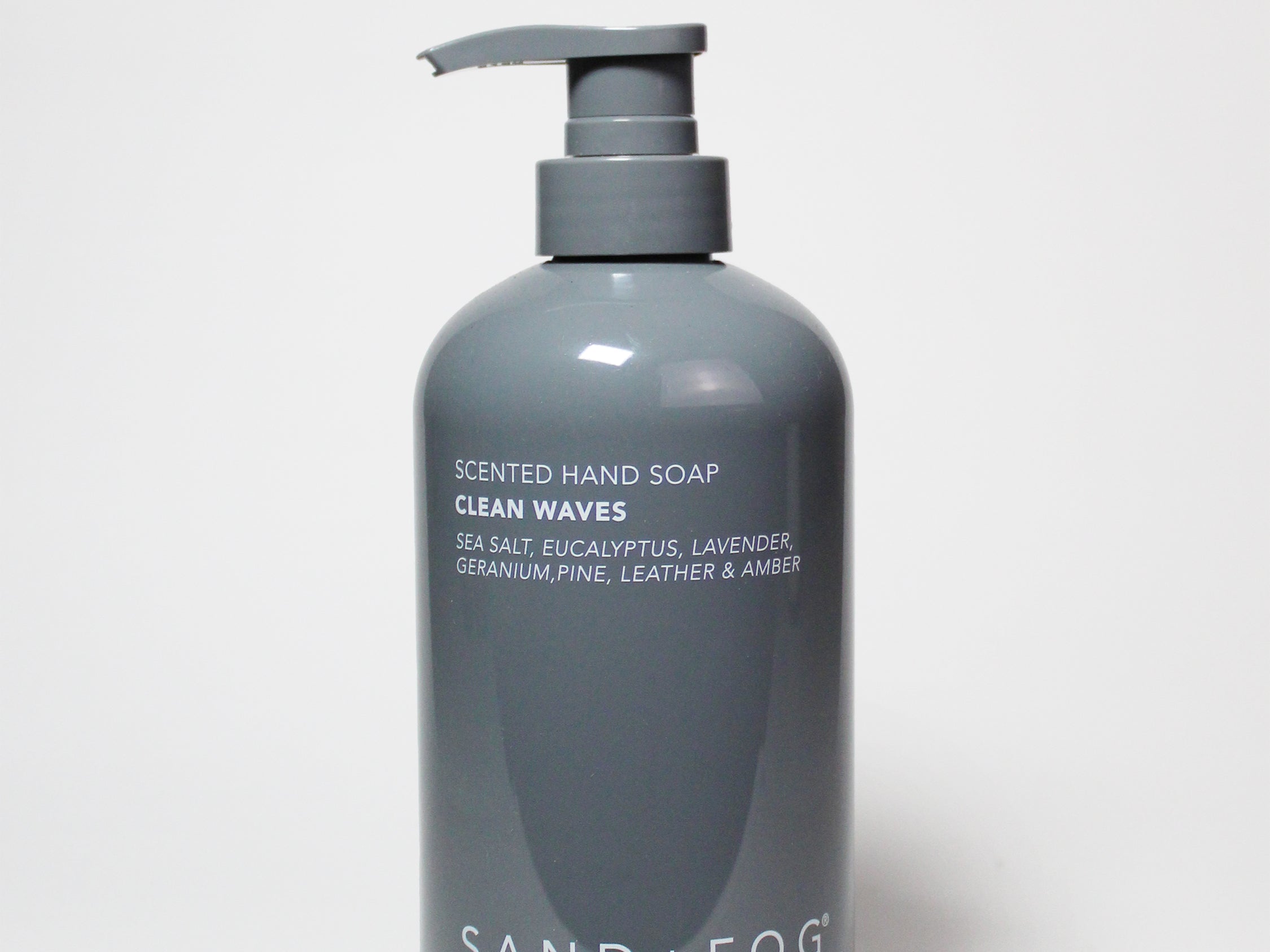 Dark gray scented liquid hand soap bottle with pump dispenser and printed label