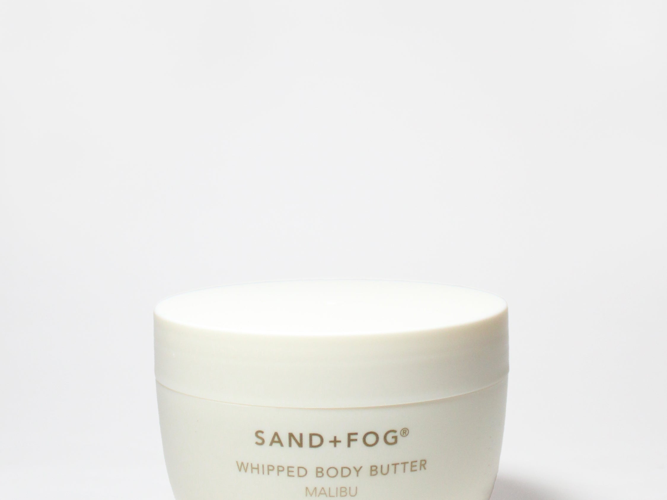 Whipped body butter jar, Malibu by SAND+FOG, off-white cream, round container