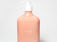 Peach body lotion bottle with white pump dispenser and label details