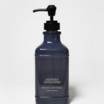 Dark blue liquid hand soap bottle with black pump dispenser