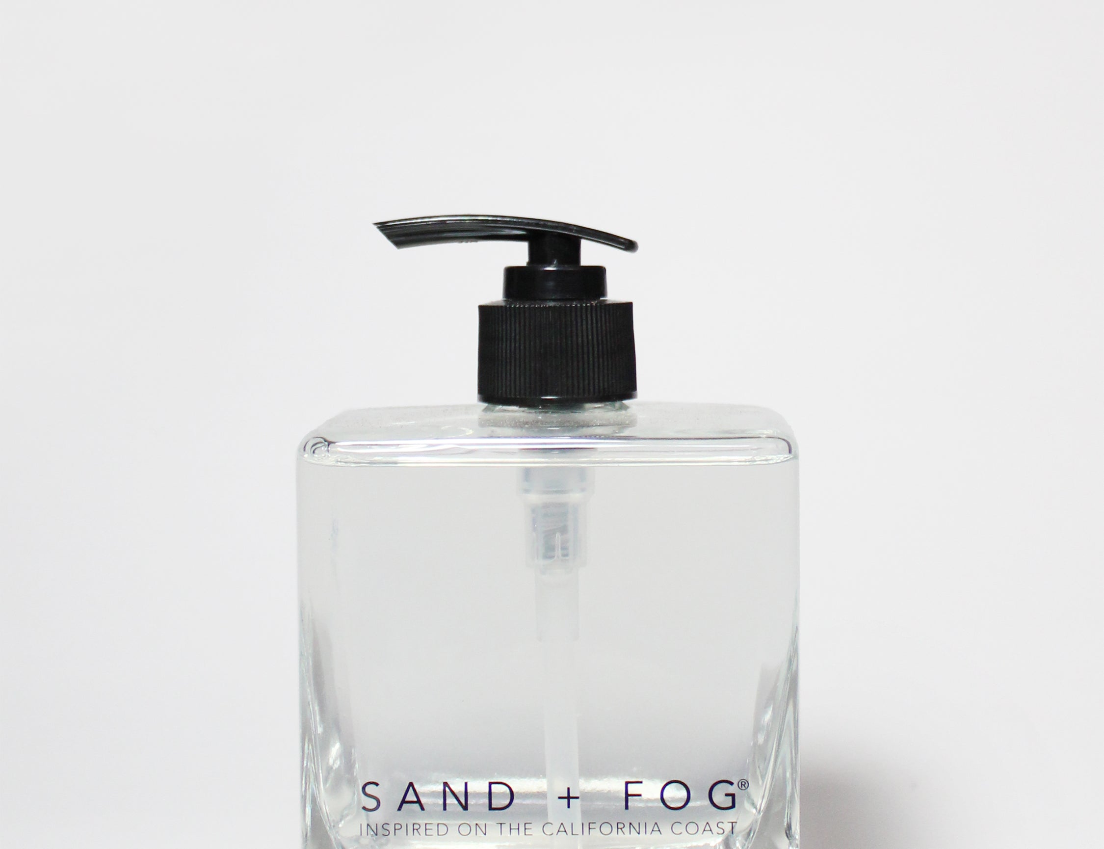 Teakwood liquid hand soap in a clear square bottle with a black pump