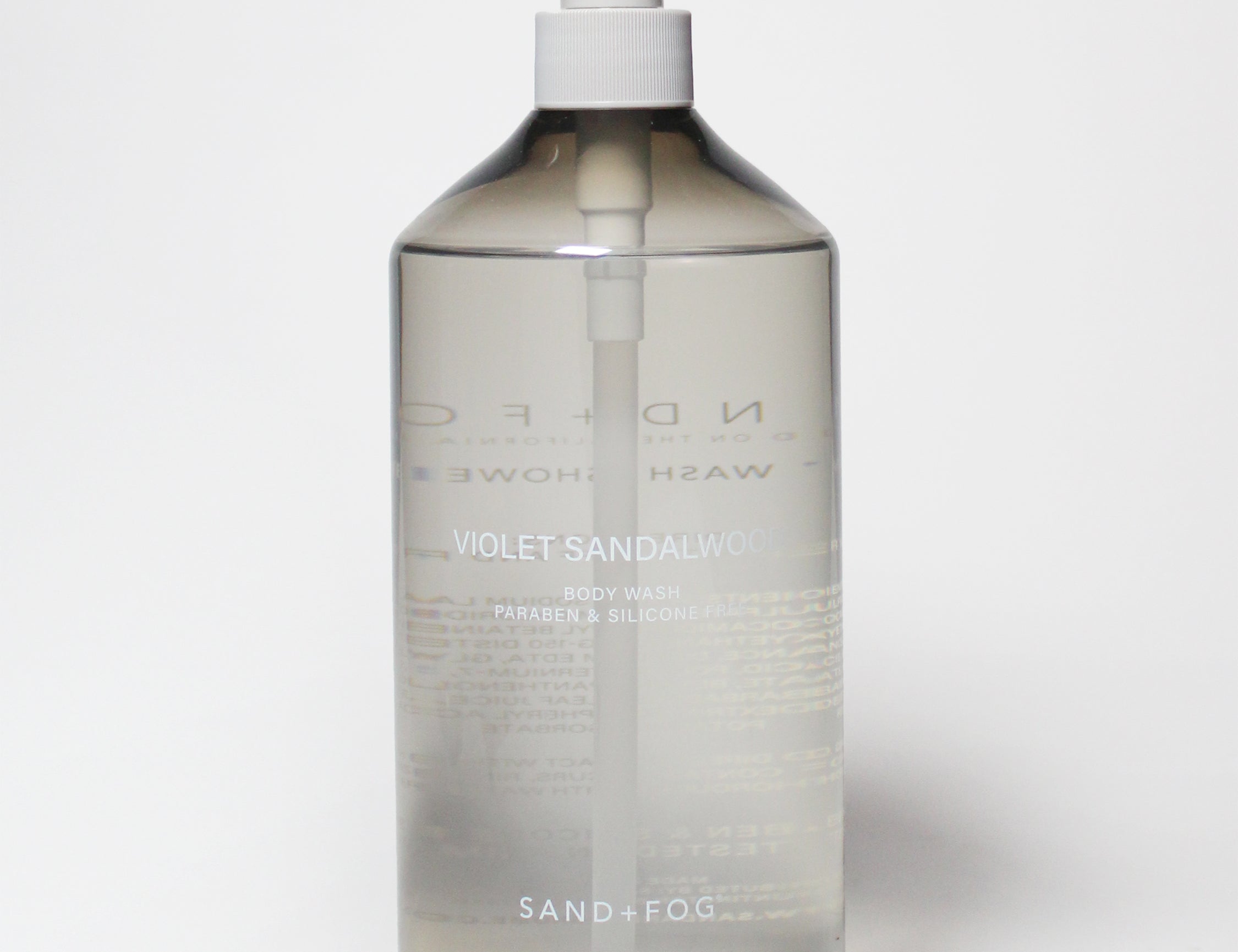 Clear body wash bottle with white pump; violet sandalwood scent, 32 oz