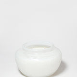 Marshmallow Suede 17 oz scented candle in a rounded white glass jar with two wicks.