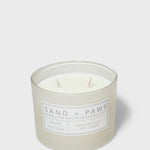 Scented candle jar with white cotton scent label and two wicks