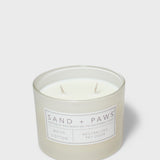 Scented candle jar with white cotton scent label and two wicks