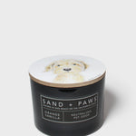 Orange vanilla scented candle in dark jar; dog portrait lid, neutral pet odor