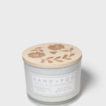 Cedarwood & Rose 12 oz scented candle in glass jar with floral lid
