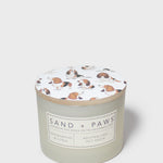 Sandalwood & Citrus scented candle jar with dog-print lid and label