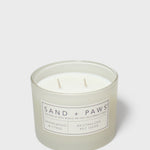 Sand + Paws 12 oz scented candle in frosted jar with two wicks