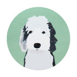 Scented candle lid with black-and-white dog face graphic