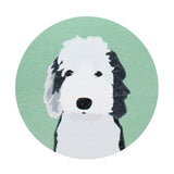 Scented candle lid with black-and-white dog face graphic